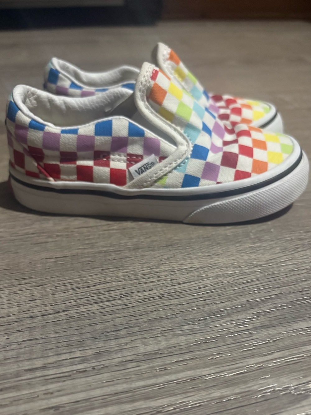 Vans. Kids. Rainbow Checkerboard Classic Slip-On Sneaker.